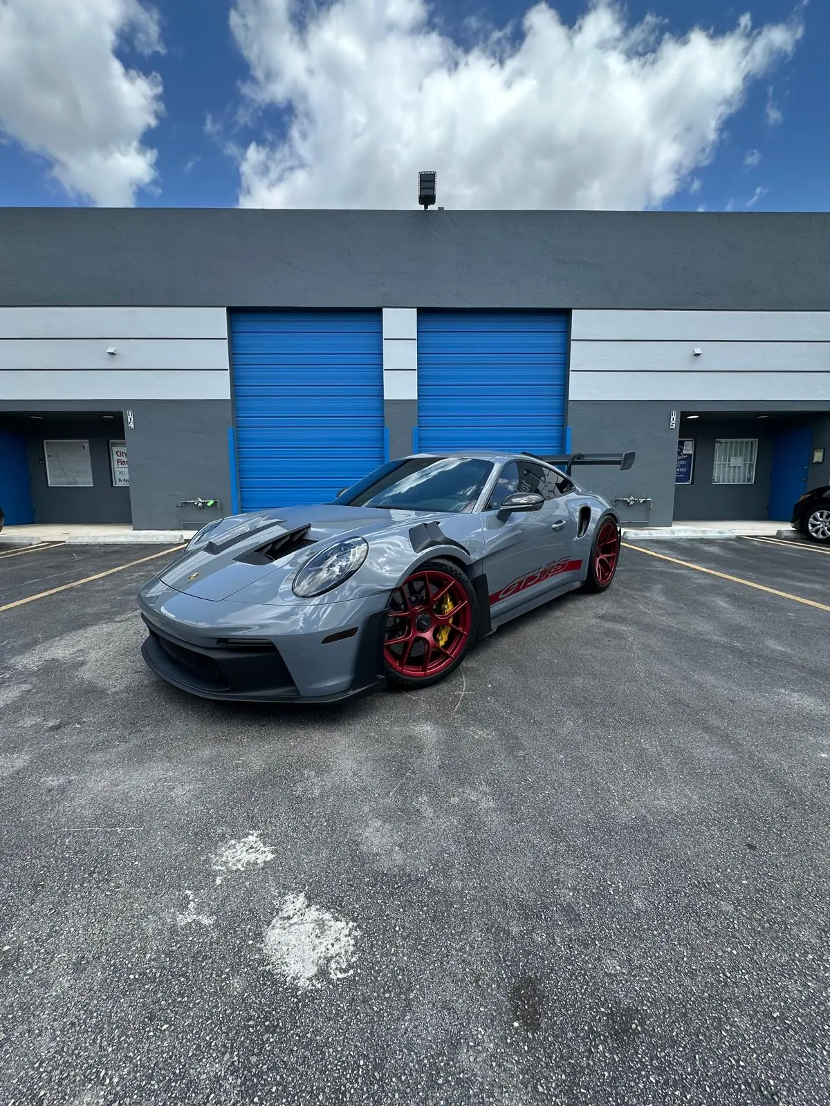Porsche 911 GT3 RS with paint protection film outside the Stealth Customs bay