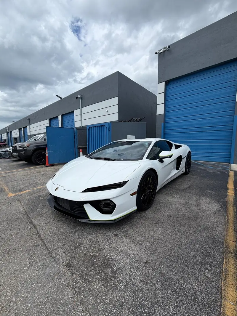 White Lamborghini Temerario outside the Stealth Customs bay